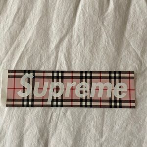 Supreme / Burberry collab sticker.